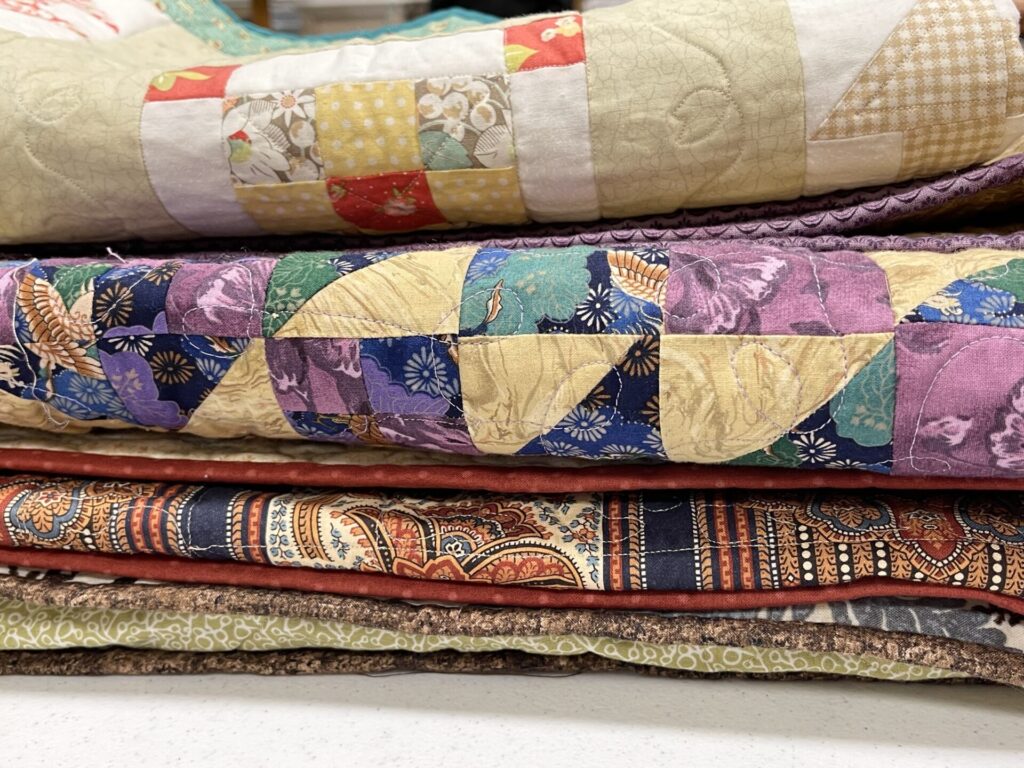 quilts on top of one another