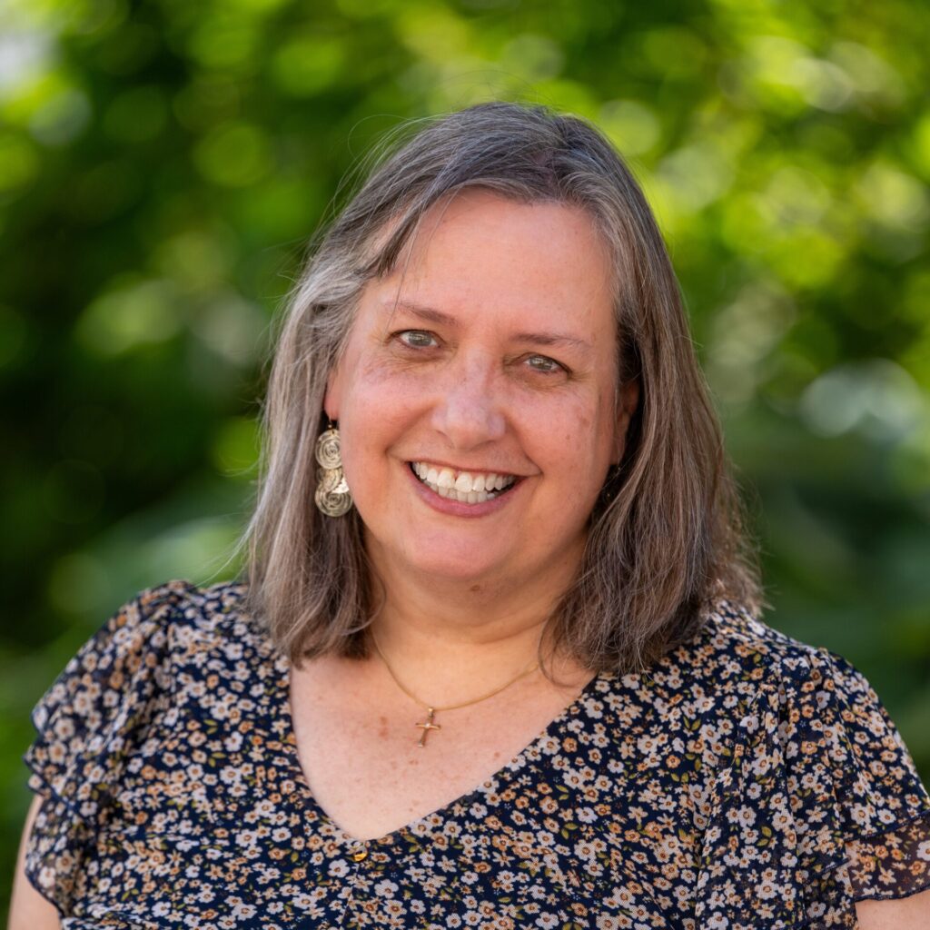 A professional headshot of Betsy Natter from Frederick Living smiling outdoors, an expert who can help you navigate your ccrc checklist.